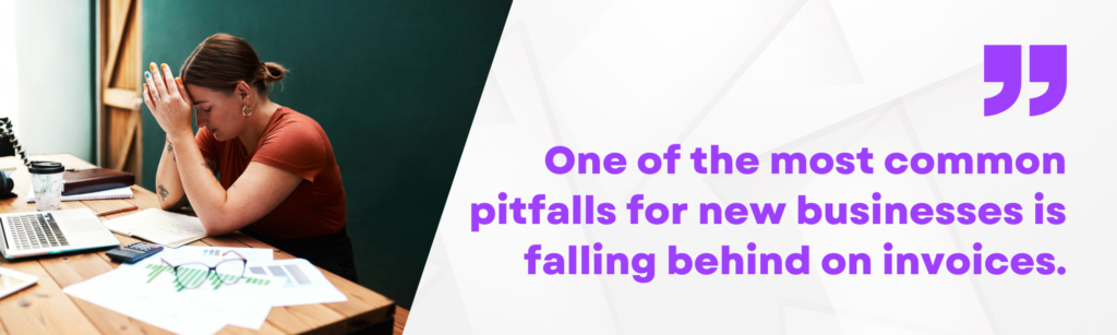 Small business owner sitting at a desk looking stressed while reviewing paperwork and a laptop. Quote text reads: “One of the most common pitfalls for new businesses is falling behind on invoices.”